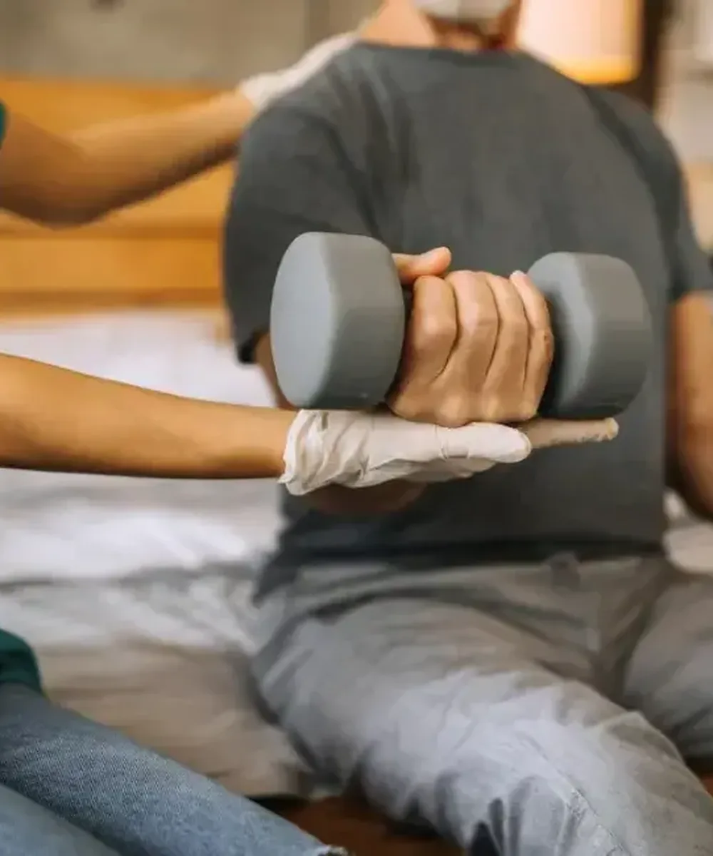 A Doctor of Physical Therapy evaluating elbow, wrist, and hand pain at Zone Physical Therapy in Greer, SC