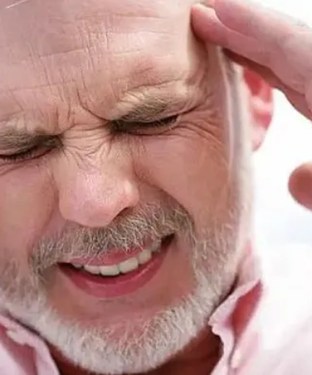 A Doctor of Physical Therapy evaluating headaches at Zone Physical Therapy in Greer, SC