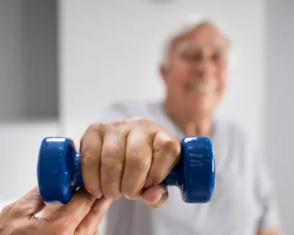 Active Release Technique being applied to a patient's shoulder at Zone Physical Therapy in Greer, SC